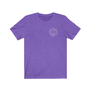 Light purple t-shirt with a Mystical Pixel logo on the left side of the chest. There is a purple version of the logo where the tag of the shirt usually would be.