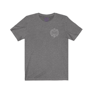 Grey t-shirt with a Mystical Pixel logo on the left side of the chest. There is a purple version of the logo where the tag of the shirt usually would be.