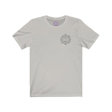 Load image into Gallery viewer, Light grey t-shirt with a Mystical Pixel logo on the left side of the chest. There is a purple version of the logo where the tag of the shirt usually would be.